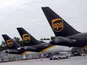 Some UPS and FedEx planes are grounded. What does that mean for holiday shipping?