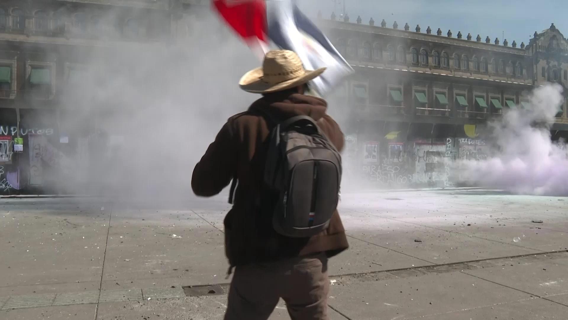 Clashes break out as thousands march against President Sheinbaum in Mexico City