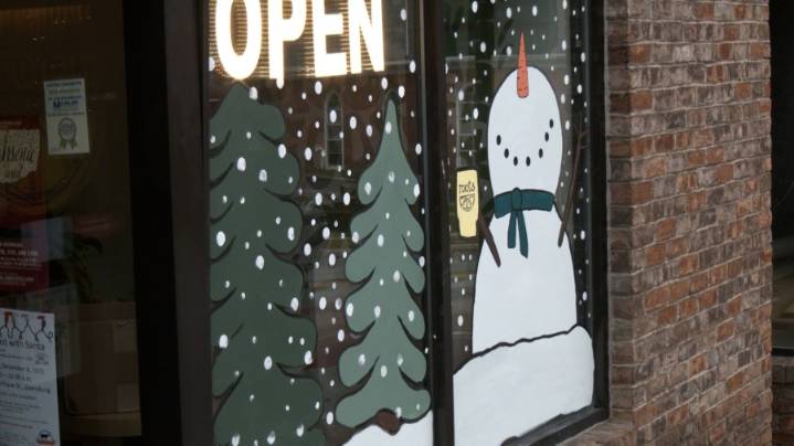 Ebensburg businesses get ready for holiday season with window art