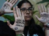 UN climate talks go into overtime as divisions over fossil fuels persist