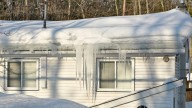 The Stocking Hack That Can Help Remove Ice From Gutters