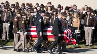 Sheriff's Cpl. Blake Reynolds is bid farewell by family, colleagues