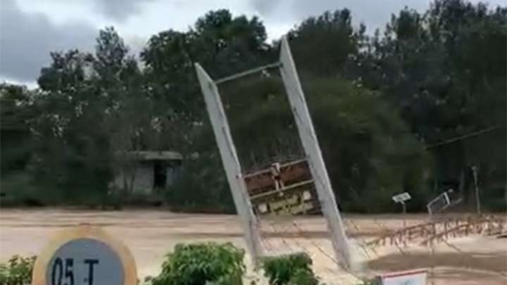 Video shows the moment a bridge is swept away by floodwaters in Vietnam