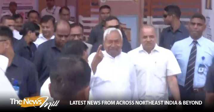 Bihar CM Nitish Kumar shows inked finger after casting his vote in Patna