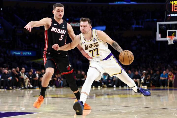 Lakers beat Heat 130-120 behind Doncic’s triple-double – Winnipeg Free Press