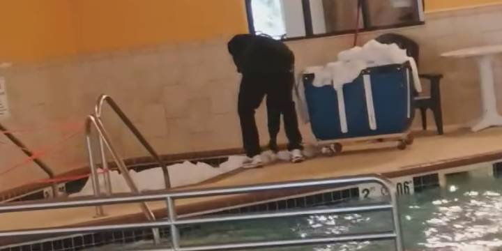 ‘That’s disgusting’: Hotel under investigation after worker seen soaking bed sheets in a hot tub