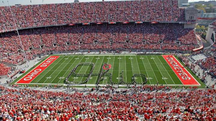 How the 89-year-old tradition of Script Ohio and dotting the i defines Ohio State and its band