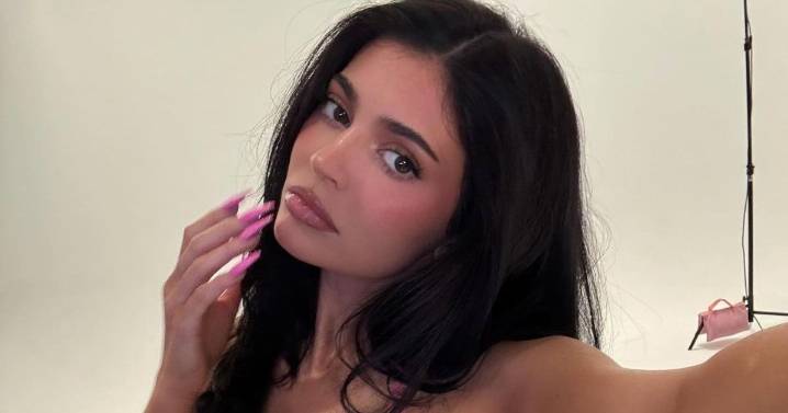 Kylie Jenner Strips It Down to Only Fur Coat in Fire Khy Photos