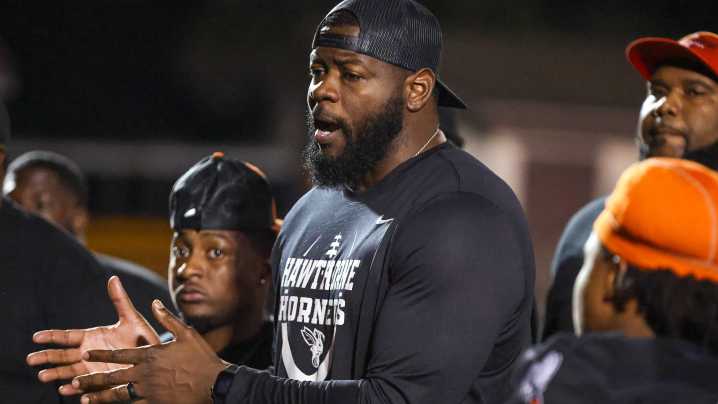 Hear Hawthorne football coach Cornelius Ingram speak after Hornets playoff win over Williston