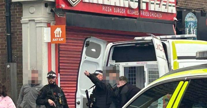 BREAKING Suspect 'pulls knife out on tram' in Manchester as armed police race to the scene