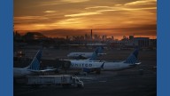 US travelers scramble to adjust as airlines cut flights because of shutdown