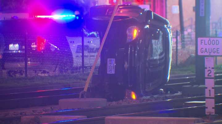 Car overturns on DART tracks in Downtown Dallas, police say