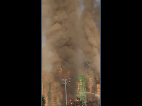 At least 13 dead in high rise fire in Hong Kong