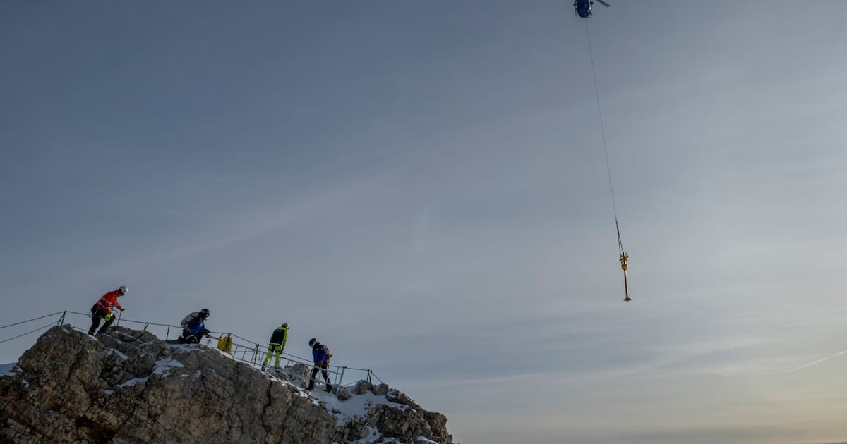 Gilded cross on Germany's Zugspitze being cleaned after visitors put stickers
