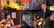 Man steps up to play at open mic night - then people realise who he actually is