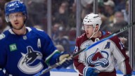 MacKinnon nets five points as Avalanche beat Canucks in overtime