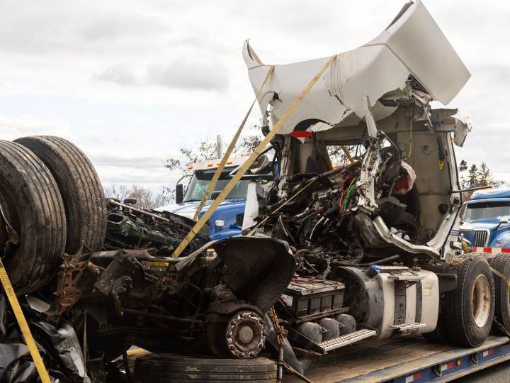 One dead after two-truck crash on Highway 401 east of London