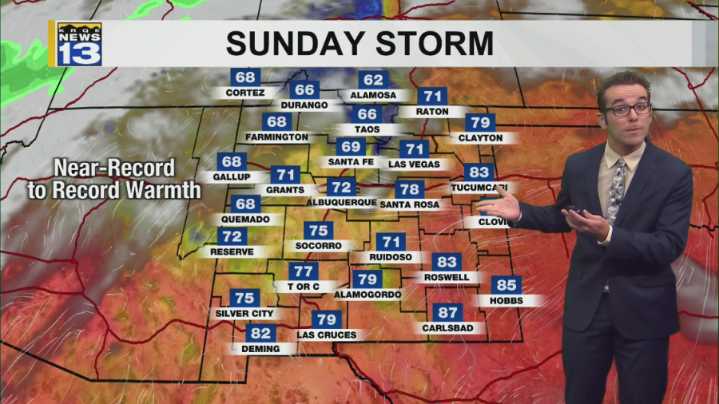 Record warmth then storm system approaches