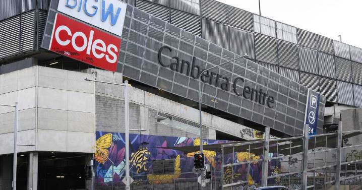 Woman charged for spitting on police at Canberra Centre
