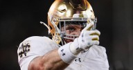 Love gets hurt but returns as No. 9 Notre Dame routs Stanford 49
