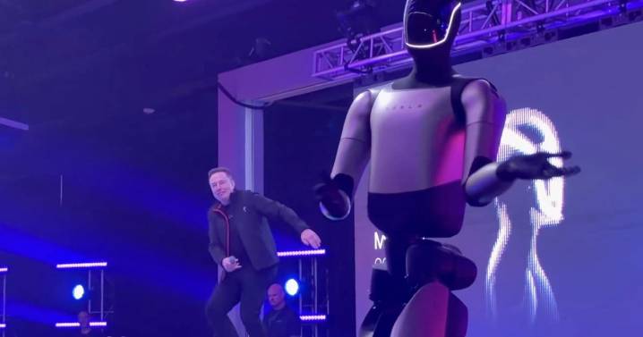 Elon Musk Does Weird Dance With Robot to Celebrate His $1 Trillion Tesla Deal