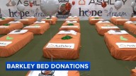 Eagles star Saquon Barkley helps surprise 50 kids with new beds in Philadelphia