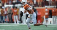 Manning throws 3 touchdowns and No. 20 Texas holds of No. 9 Vanderbilt