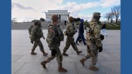 US halts all asylum decisions after shooting of National Guard members