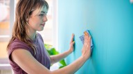 Hide The Eyesore Of Wall Stains & Imperfections With One Clever Design Trick