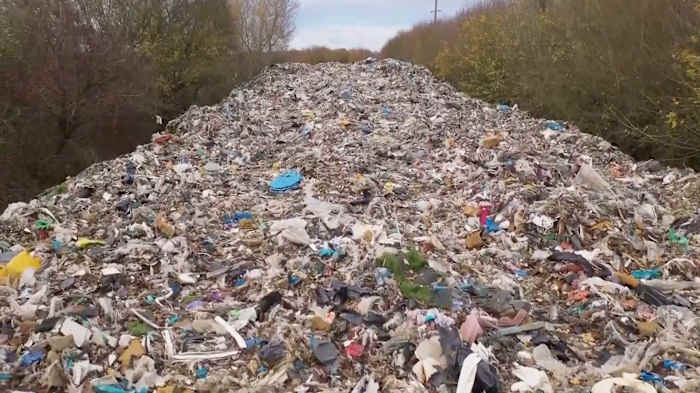 Mountain of illegally dumped trash near Oxford river causes outcry in England
