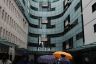 UK government defends the BBC as critics circle and Trump threatens to sue