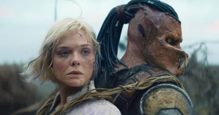 Review: Even a robot needs a beastie bestie in 'Predator: Badlands,' enlivened by Elle Fanning