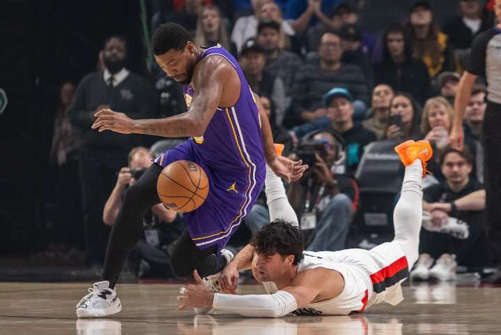 Shorthanded Los Angeles Lakers cruise past Trail Blazers: Rapid Reaction