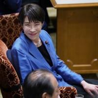 China, inflation could pop Japan PM's bubble