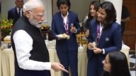 PM Modi serves food to wheelchair-bound Pratika Rawal at champions' meet in Delhi