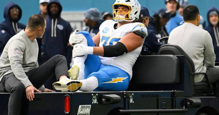 Chargers' Joe Alt carted off field with ankle injury against Titans