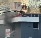 Fire crews battle flames in Darby Township transmissions shop