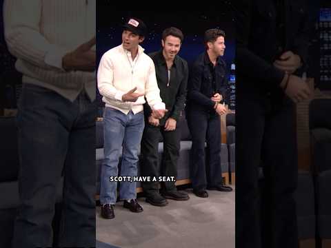 Random man Scott Kelly crashes the #JonasBrothers interview to address his resume going viral 👀