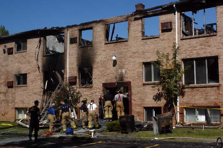 20 years after arsonist torched Flint area apartment complex, teardown gets started