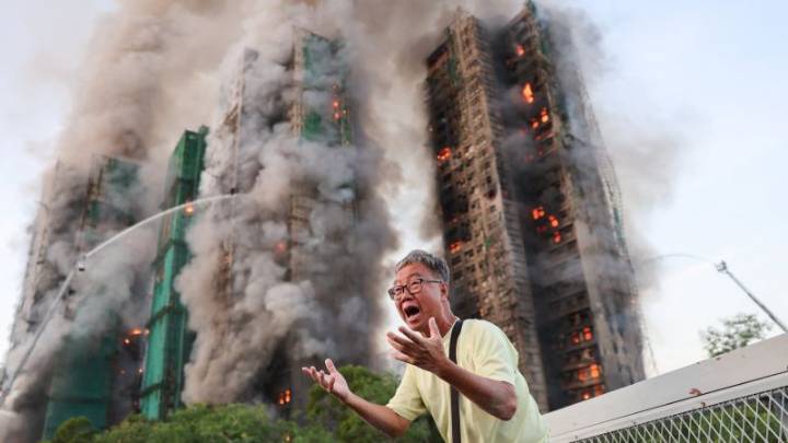 4 killed as fire rages through Hong Kong high