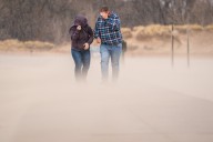 High winds, large waves draw people to the Lake Michigan shore during storm