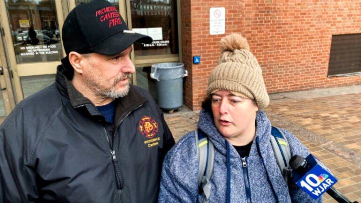 Eight charged after Rhode Island woman found dead in woods