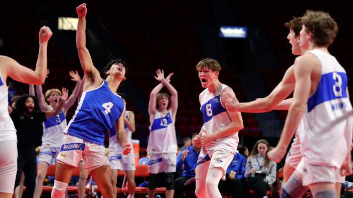 See photos from WIAA state volleyball action on Nov. 6 at Resch Center