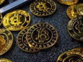 Bitcoin drops under $100,000, hits four