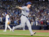 Smith's homer in 11th lifts Dodgers over Blue Jays 5-4 to become first repeat champion in 25 years