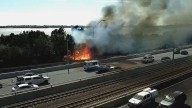 Bushfire at Royal Perth Golf Club at South Perth on edge of Kwinana Freeway causes heavy delays