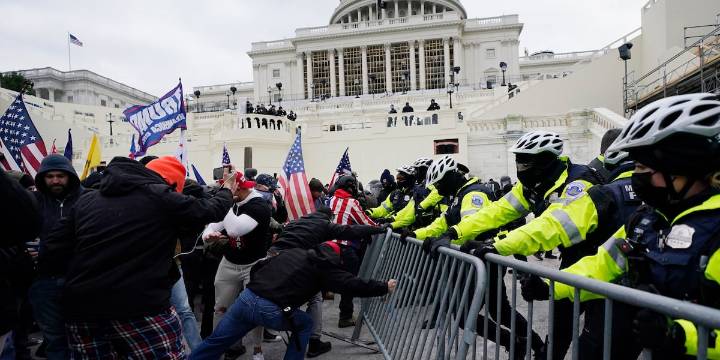 Trump pardons Jan. 6 rioter for gun offense and woman convicted of threatening to shoot FBI agents