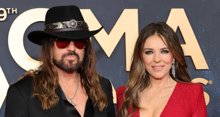Billy Ray Cyrus & Elizabeth Hurley Hold Hands on CMA Awards 2025 Red Carpet | 2025 CMA Awards, Billy Ray Cyrus, CMA Awards, Elizabeth Hurley | Celebrity News and Gossip | Entertainment, Photos and Vid