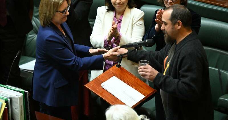 'Side by side': first treaty signed into law