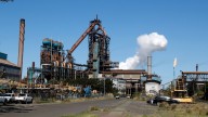 Contract worker in his mid-20s dies after steel beam falls on him at BlueScope Port Kembla factory